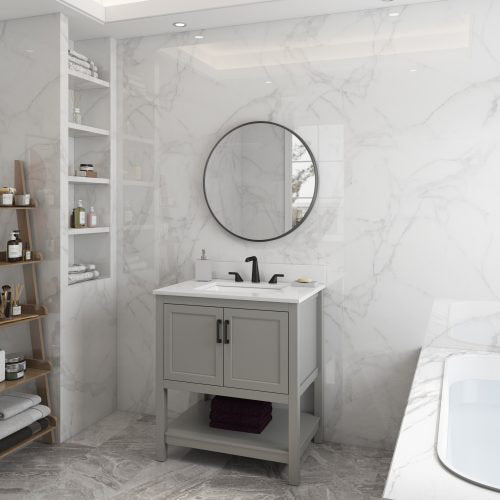 Freestanding 31-inch single-sink bathroom vanity with a white stone top and stone-colored solid wood base, two-door cabinet over an open shelf, matte black faucet and round mirror against marble walls.