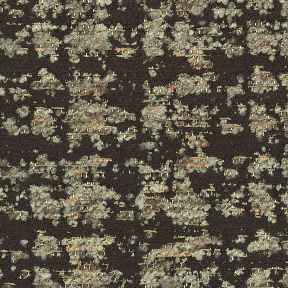 Close-up of dark woven upholstery fabric with beige and cream looped yarns and subtle orange flecks; textured contemporary fabric composed of 41% viscose, 9% acrylic and 50% polyester for sofa use.