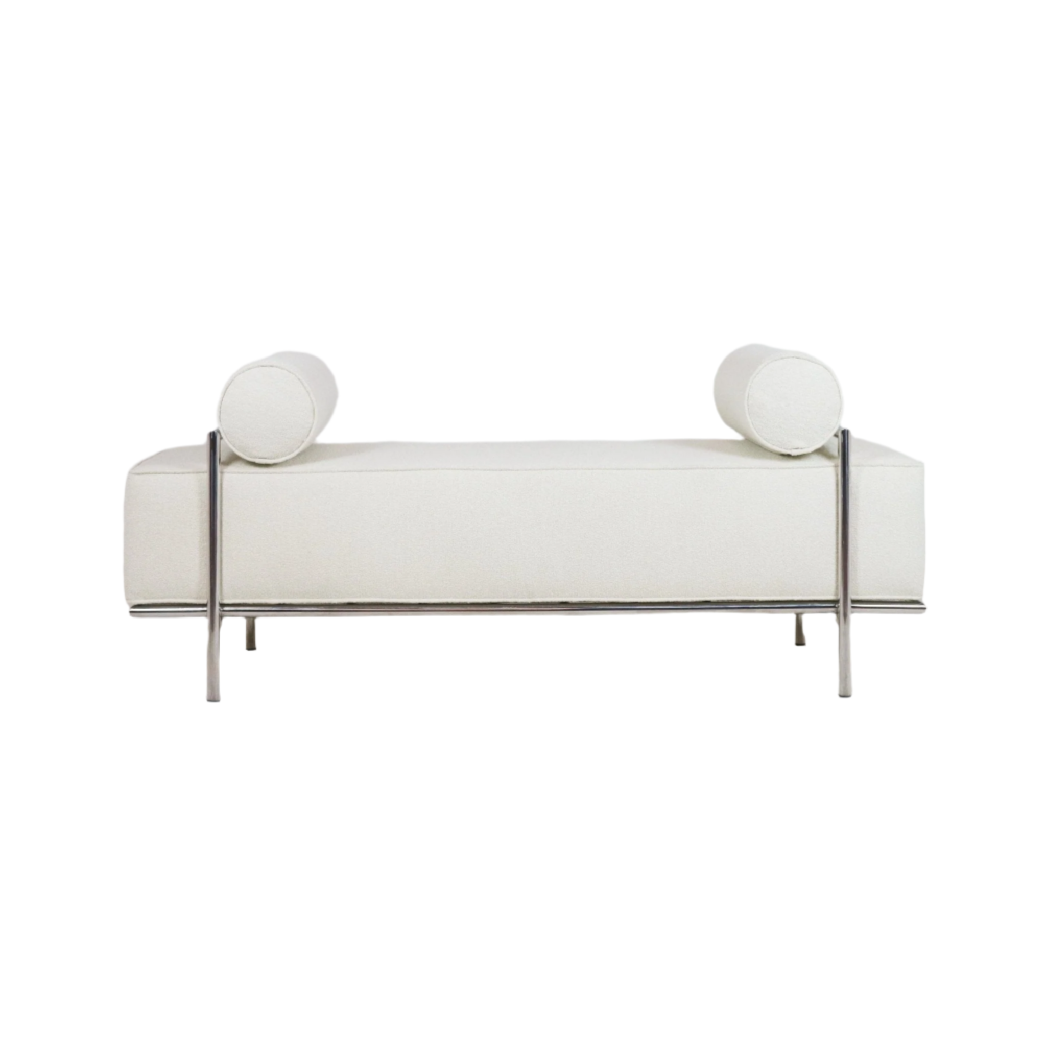 White upholstered end-of-bed bench with two cylindrical bolster pillows, thick cushioned seat and slim polished metal frame and legs in a modern, minimalist design.