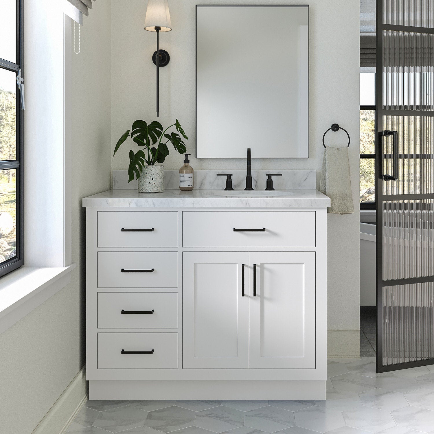 43-inch freestanding white solid wood bathroom vanity with stone marble top, centered black faucet and matte-black pulls, multiple drawers and a two-door cabinet, rectangular mirror above, potted plant and towel ring nearby.