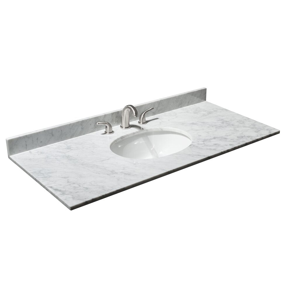 White Carrara marble vanity top with integrated oval white ceramic sink, low marble backsplash and brushed nickel widespread faucet, shown isolated on a white background.